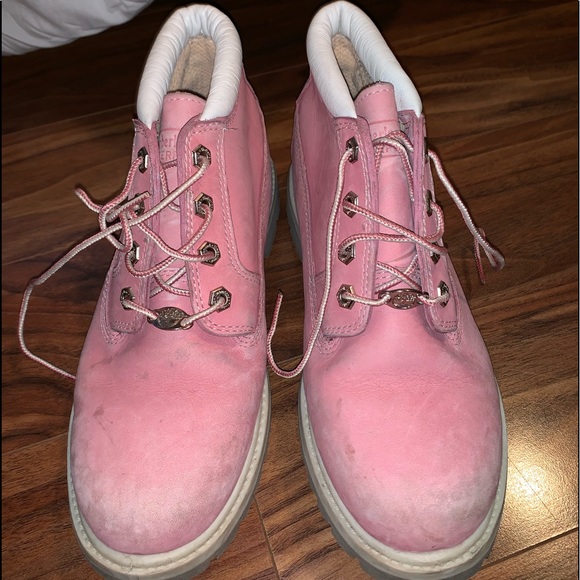 pink timbs with bow